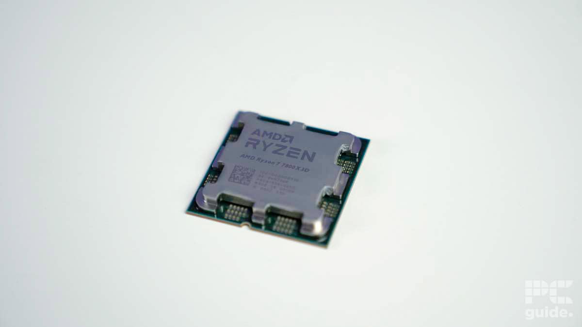 A close-up of an AMD Ryzen 7 processor on a white table