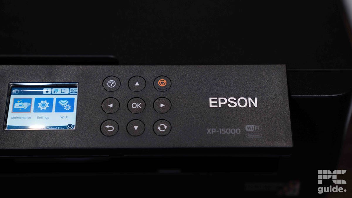 Close-up of an Epson Expression XP-15000 wide-format printer control panel with buttons and a digital display.