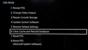 A tutorial on how to clear the cache on a PS5, showcasing a screenshot with the option 'clear cache and rebuild database' highlighted.