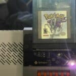 Pokémon Crystal Version cartridge mounted on ASUS ROG Ally