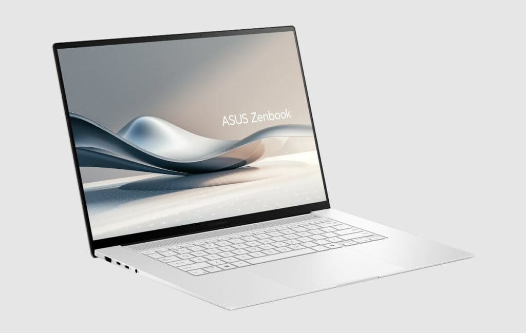 A silver ASUS Zenbook laptop with a sleek design is open, displaying its screen with a subtle abstract graphic and the words "ASUS Zenbook," echoing excellence showcased at Computex.
